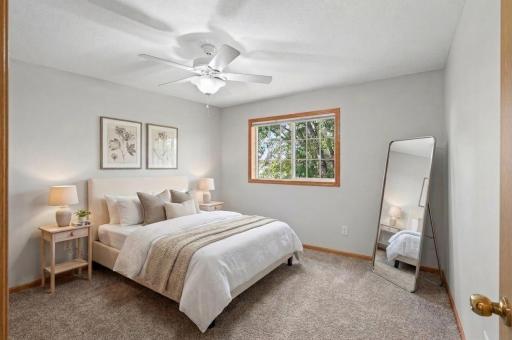 Virtually staged primary bedroom on the upper level.