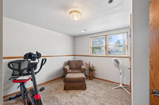 Spacious fourth bedroom is ideal for guests, an at home office, play room, and more!