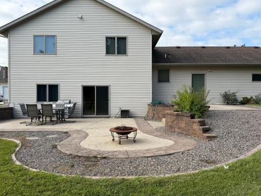 Backyard walk out patio with stamped concrete.