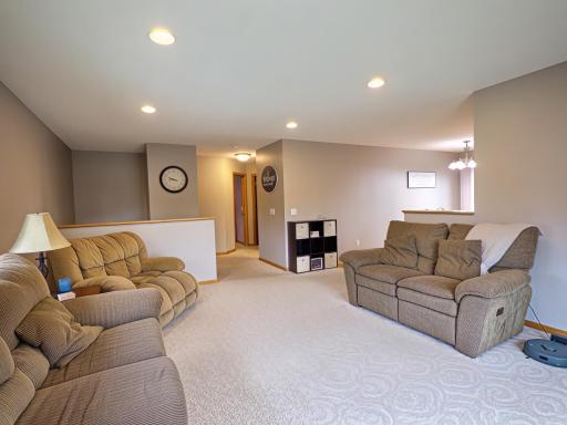 Living room as you walk upstairs. Nice separation from the kitchen and dining area.