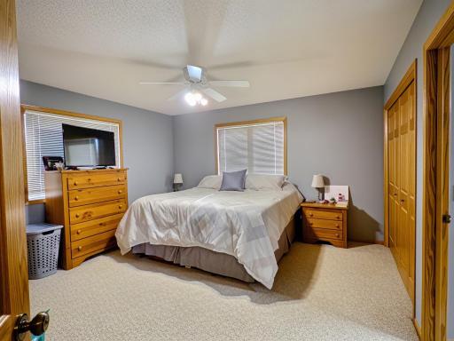 Spacious primary bedroom offers a comfortable retreat at the end of the day.