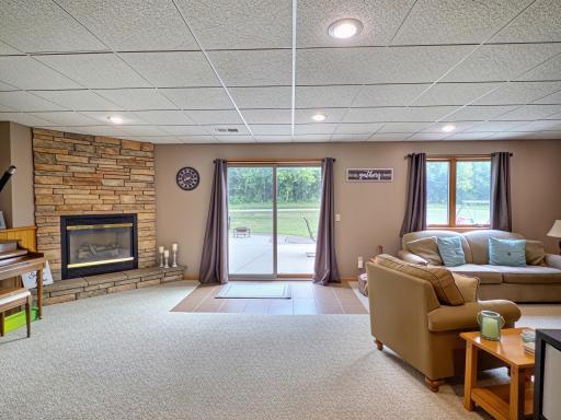 Step outside to the walk-out patio, perfect for morning coffee, summer gatherings, or relaxing evenings.