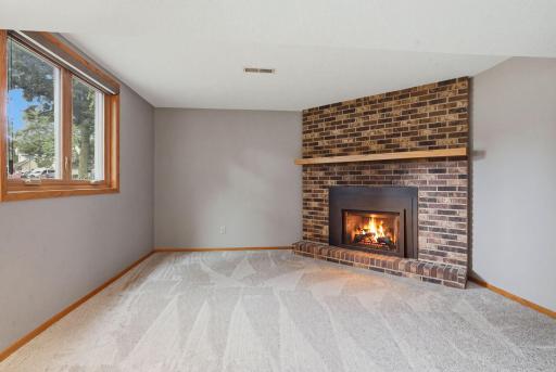 Once a wood burning fireplace the sellers converted it to natural gas with this beautiful insert.