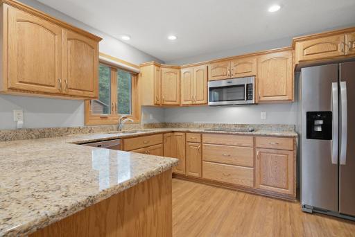 Quartz Countertops, Stainless Steel Appliances, Cooktop, Pots and Pans drawers and so much cabinet and countertop space.