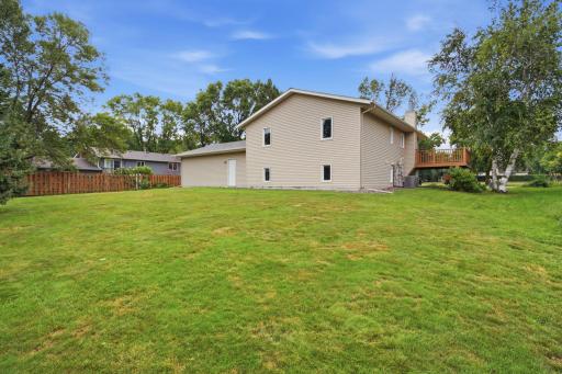 The spacious backyard is just waiting for you to plan something fun. Maybe a firepit area or extra patio.