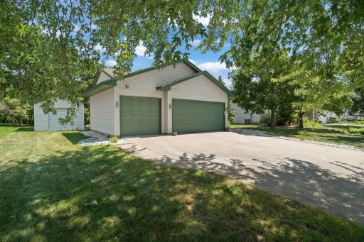 A spacious three-car garage provides plenty of room for vehicles, storage, and everyday convenience.