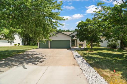 A spacious three-car garage provides plenty of room for vehicles, storage, and everyday convenience.