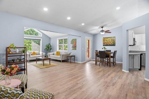 The open-concept layout connects the living room, dining area, and kitchen for effortless gatherings.