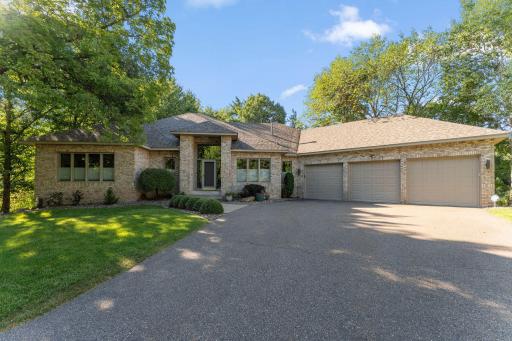 Spacious rambler tucked away at the end of a quiet cul-de-sac in a stunning 1.38 acre natural setting. 2026 updates include: New roof (with 50 year transferrable shingle warranty), new siding, 2 new skylights and more!