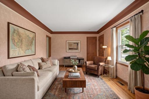 Main level: living room off front door (virtually staged)