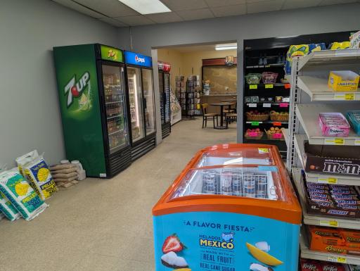 Ice cream freezer, soda, entrance to back section of stor.jpg