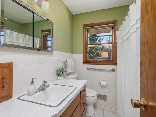 Freshly painted full bathroom on the main level.
