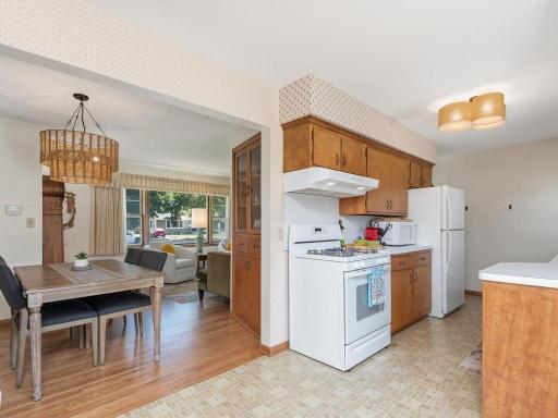 Kitchen, dining and living room. Wood floors were recently refinished.