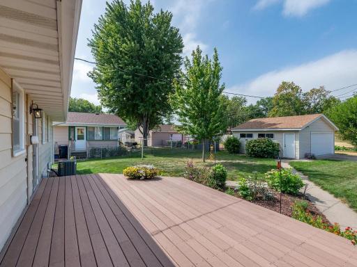 Refreshed deck with stairs to the back yard area.