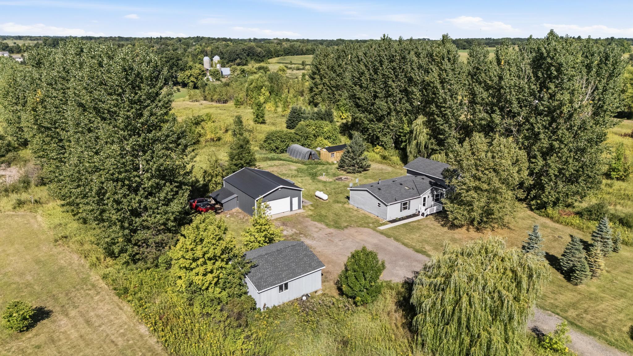 Beautiful home w/ garage and pole shed