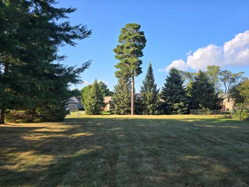 Nicely wooded, playground and trails nearby