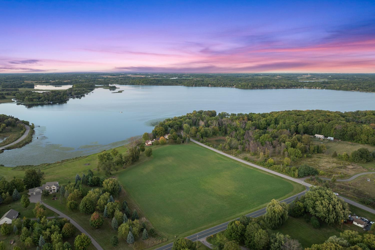 The whole picture: acreage, lake frontage, and possibility!