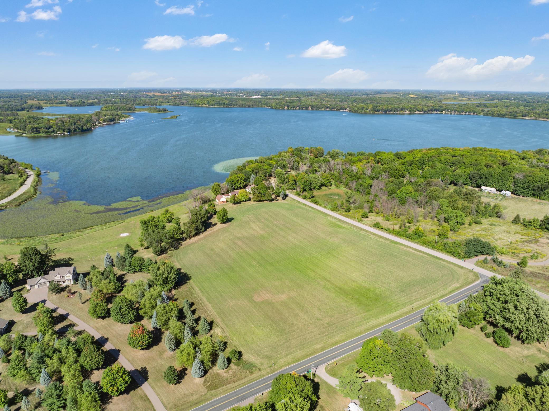 This lot has acreage, frontage, and possibility!