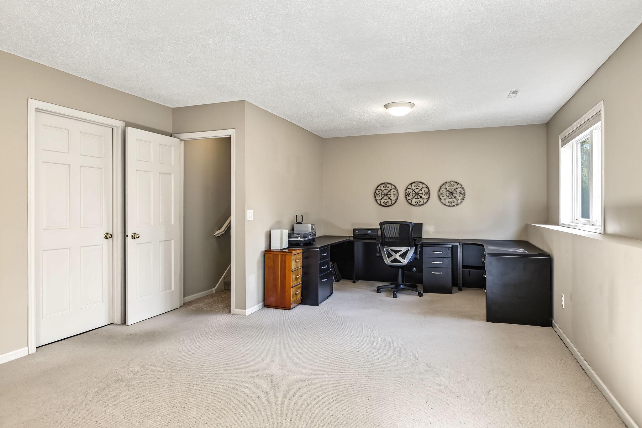 Bonus space within the family room offers incredible versatility—perfect for a home office, exercise area, hobby space or whatever best suits your lifestyle!