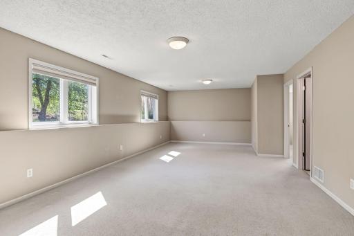 Light, bright and spacious family room offering plenty of room to relax, gather and entertain.