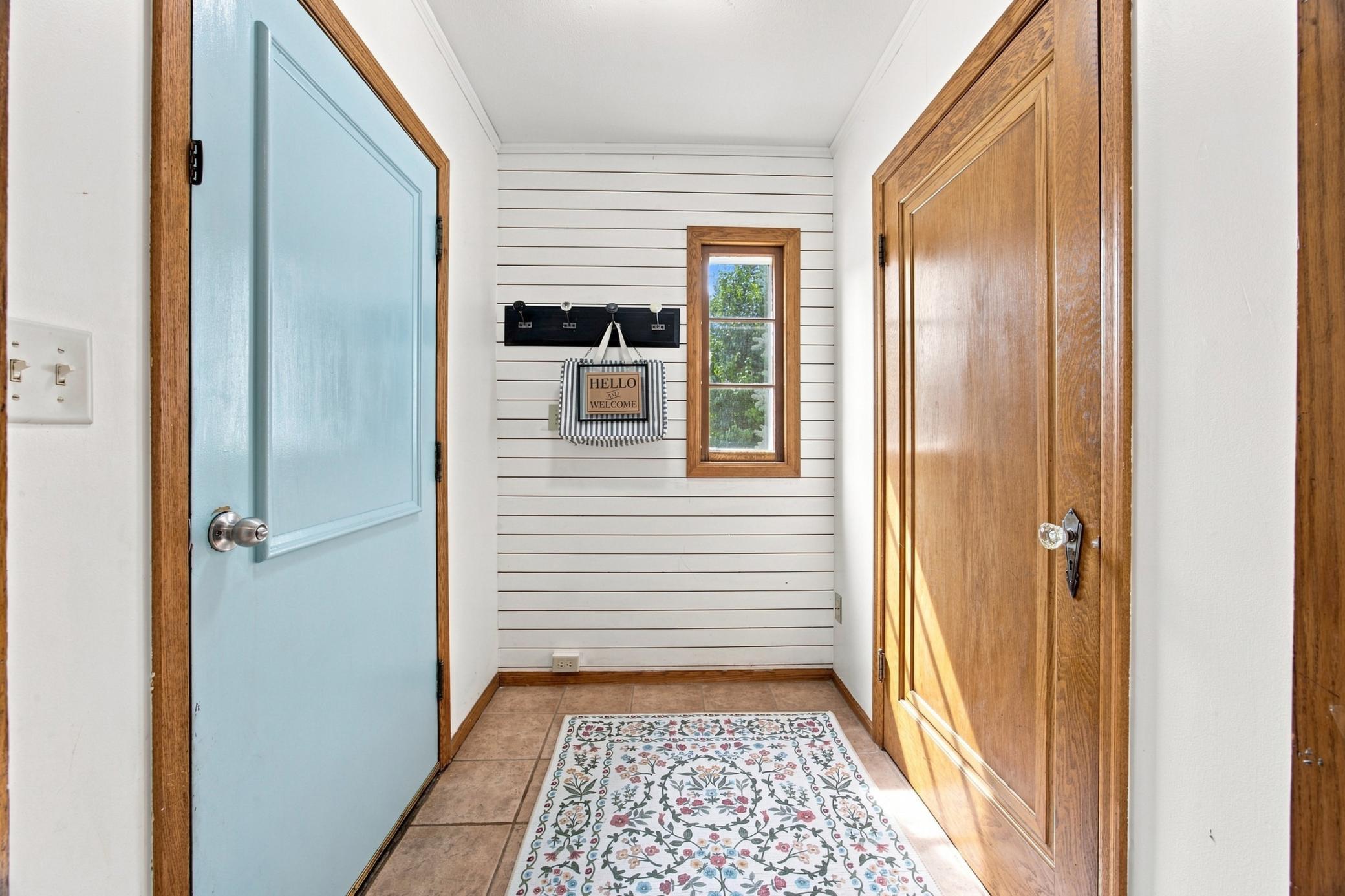 Foyer with Cedar Lined Closet - Original Hardwood doors through out have Glass Knobs