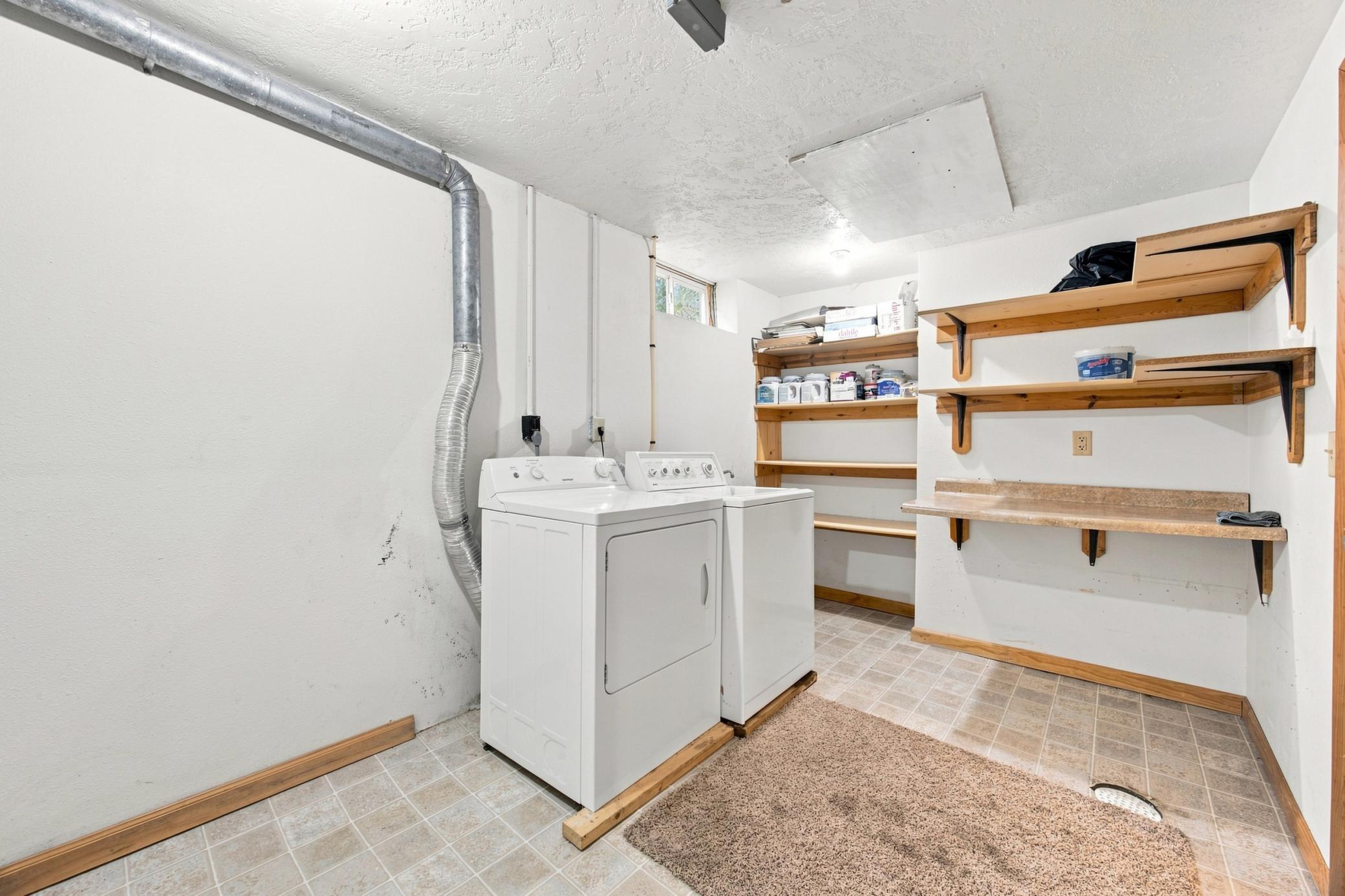 Laundry Room with Laundry Sink and Storage