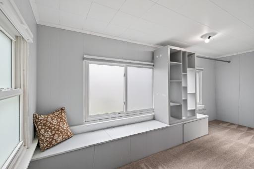 Walk in closet in main floor bedroom