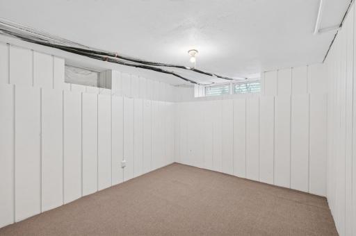 Lower level bonus room perfect for office or crafts