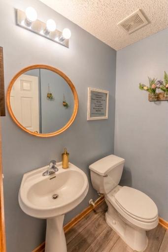 Conveniently located main floor half bath.