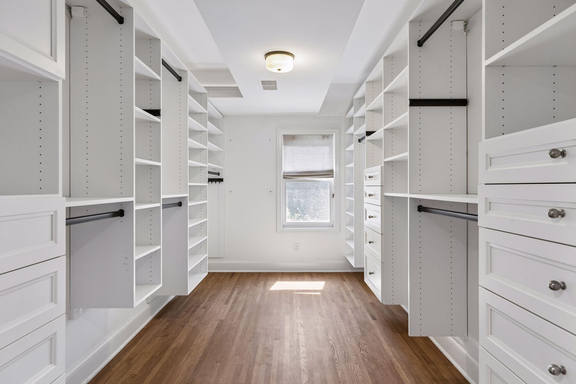 Generous and well appointed walk-in closet with a south-facing window.