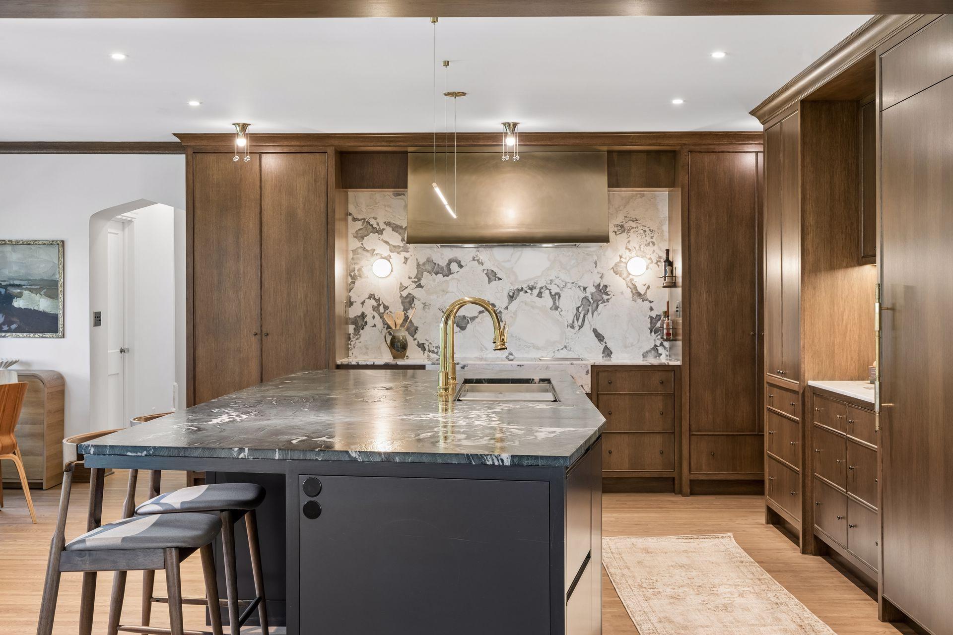 Seating for up to three around the large kitchen island. This gourmet kitchen offers every convenience and a beautiful setting for every day use.