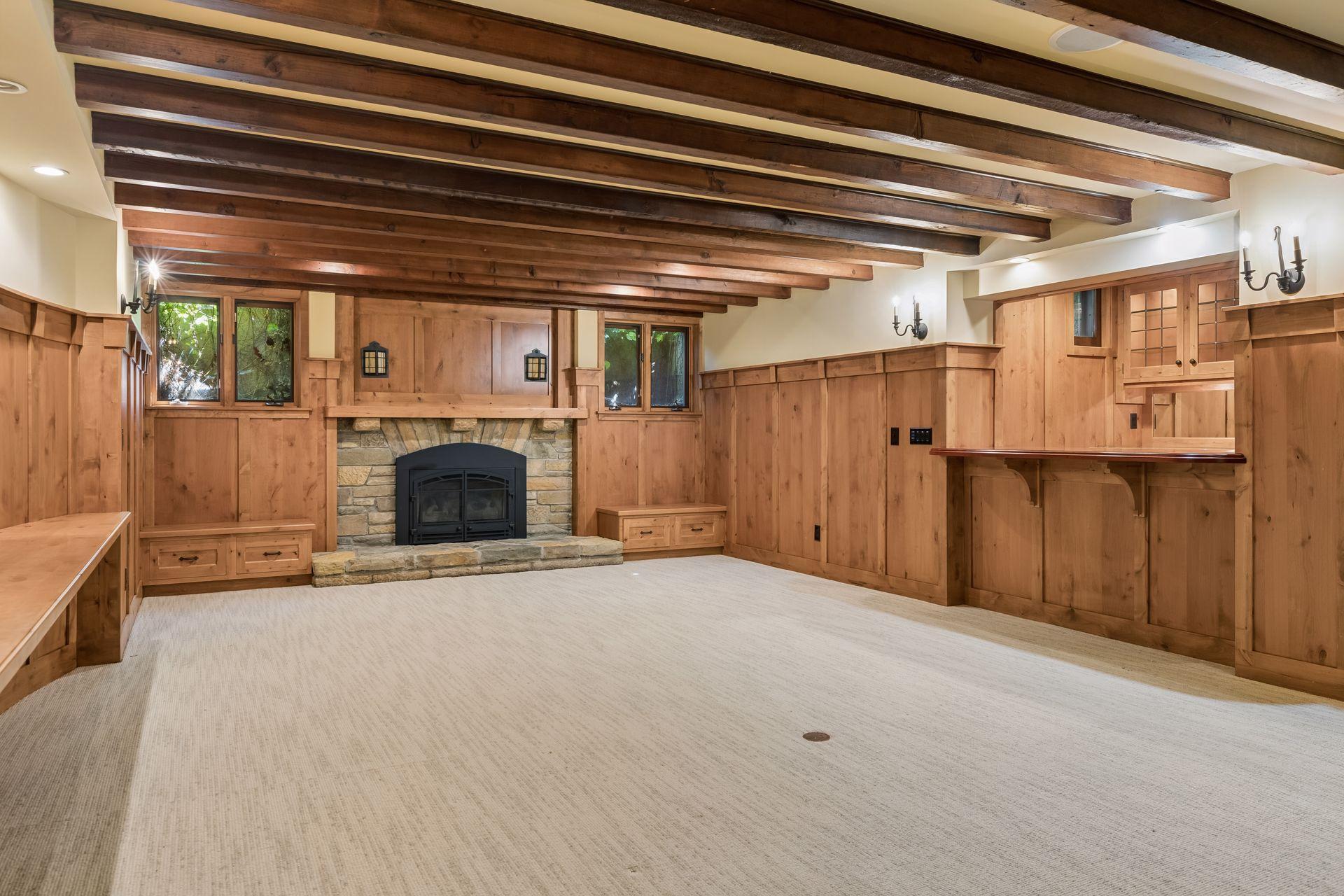 Lower level recreation room and kitchenette. Additional 3/4 bath with steam shower. This lower level could be an additional guest space, as well.