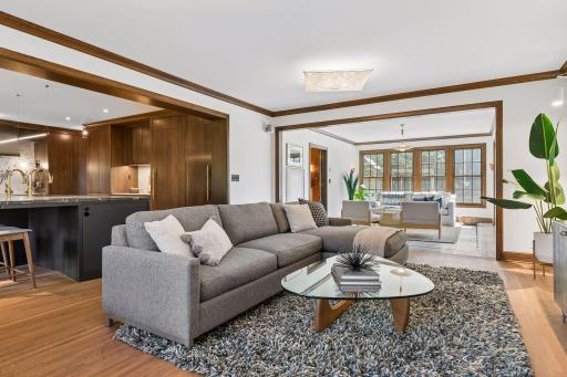 Main level family room adjacent to the kitchen and sunroom.