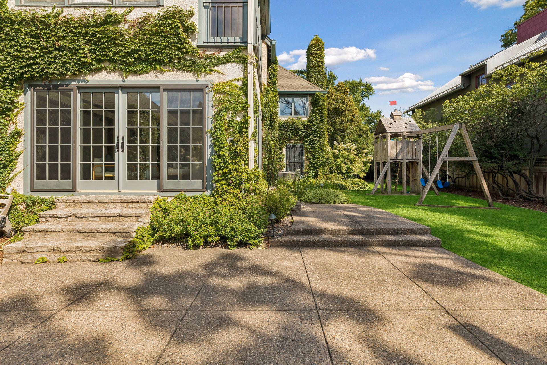 Patio and yard. A service door to the garage provides easy access to stored items: patio furniture cushions, lawn games, etc.