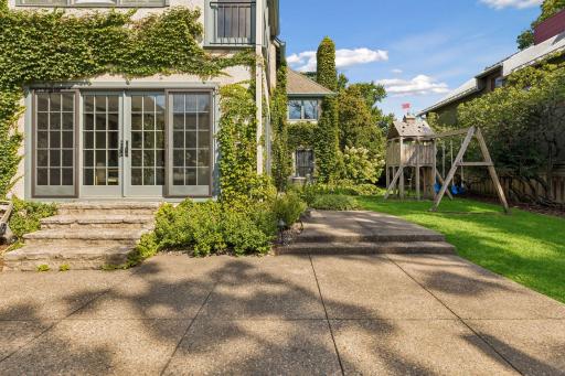 Patio and yard. A service door to the garage provides easy access to stored items: patio furniture cushions, lawn games, etc.