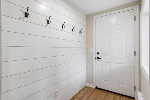 Mudroom space added off foyer/garage entry