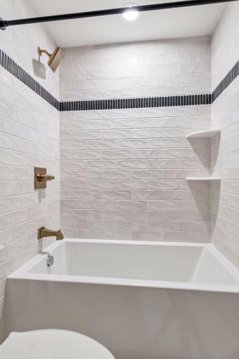 Upper level hall bath - no press in showers here!