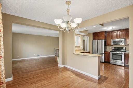 Informal dining room connects the kitchen and living room