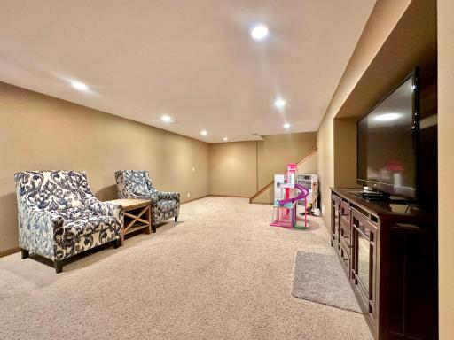 A reverse look at the family room with great LED lighting when needed.
