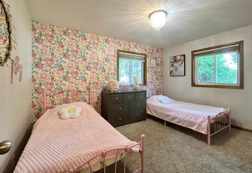 One of two bedrooms on the main. Cute as can be!!