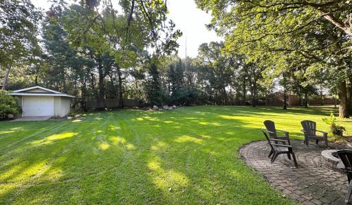 This backyard is fantastic and it comes with a good sized garden shed to keep the clutter out of the garage.
