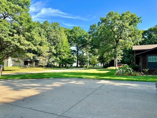 A look north down the street of this quiet park like neighborhood.