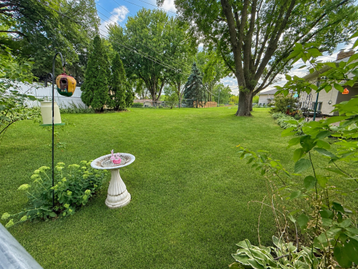 Large fenced backyard.