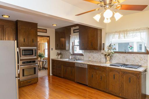 Large kitchen with stainless steel appliances.