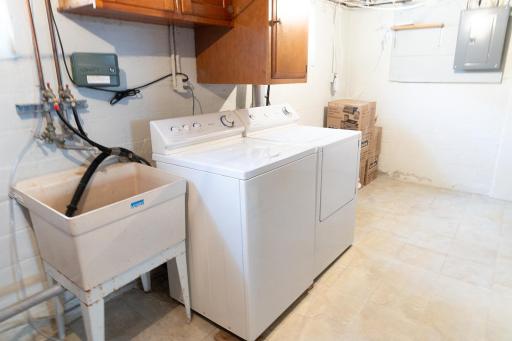 Washer, dryer, laundry tub. The irrigation panel is this room, as well.
