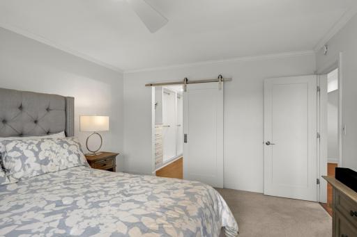 Primary Bedroom with walk in closet and updated bathroom