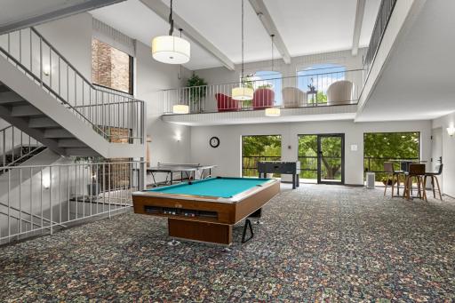 Game room with pool, ping pong, and Foos Ball.