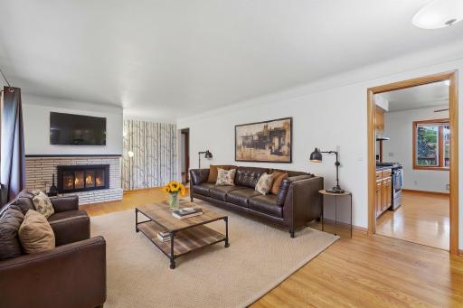 Living room with fireplace. Virtually staged.