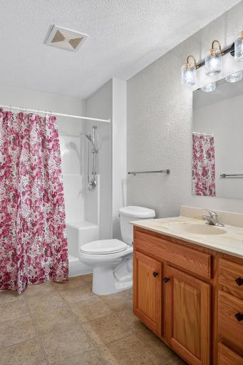 Primary bath with walk-in shower.