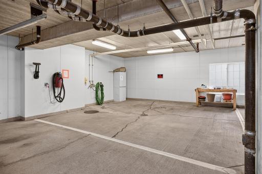 Shared car wash in heated garage.